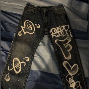 Relaxed Fit Vintage Style Blue Jean with “FLi$O” Graffiti.